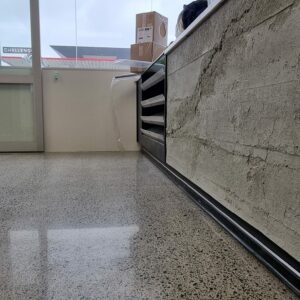 Industrial polished concrete floor service station Tauranga NZ Grinders Challenge Tauriko Muros board
