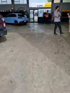 Workshop polished concrete floor Tauranga NZ Grinders before