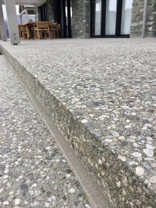 outdoors4 close up of external steps on a patio with full stone exposure and a bush hammer finish