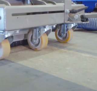 close up image of a floor under a concrete chase cutter with a 8mm channel cut into the concrete 20cm wide