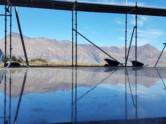 What is the best way to clean polished concrete floors?