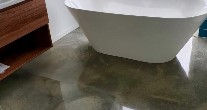 Residential bathroom with polished concrete floor NZ Grinders