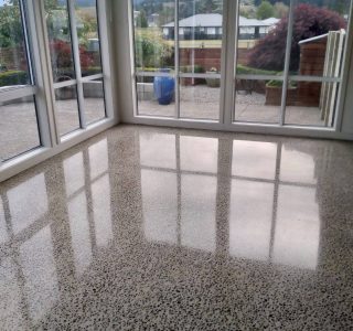 Polished concrete floor lounge residential house Tauranga NZ Grinders Wellington