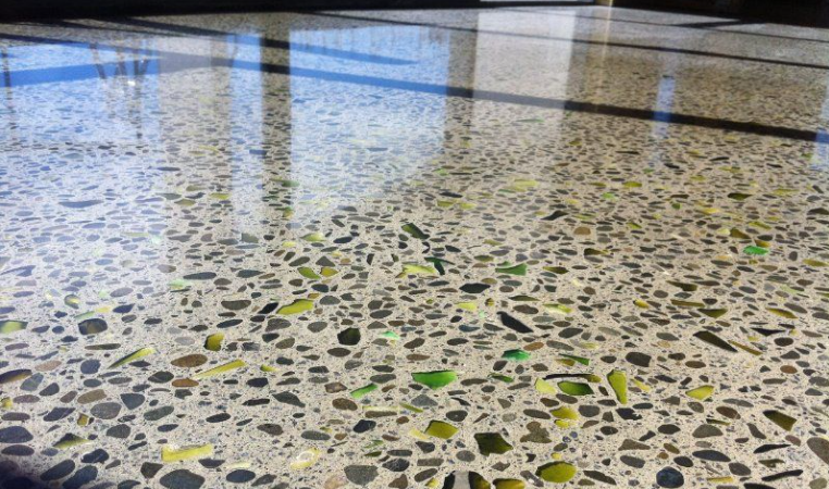 Polished concrete floor seeded with glass