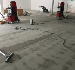 Concrete grinding a floor