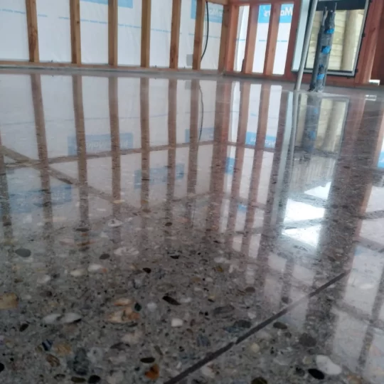 Full stone exposure aggregate floor NZ Grinders Tauranga Queenstown