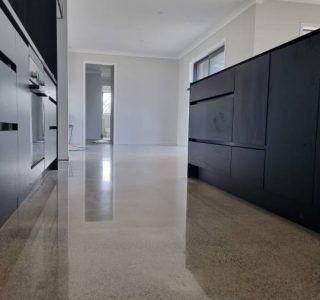 Salt and pepper finish for a beach house polished concrete floor nz grinders tauranga kitchen