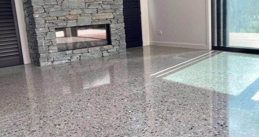 Polished concrete floor in front of fireplace Wellington